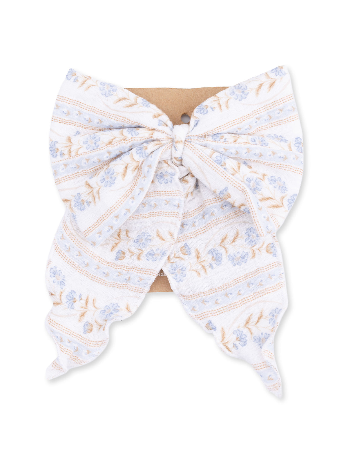 Floral patterned hair bow in blue and white, displayed on a brown cardstock tag.
