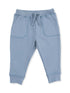 Light blue children's sweatpants with pockets and drawstring at the waist.