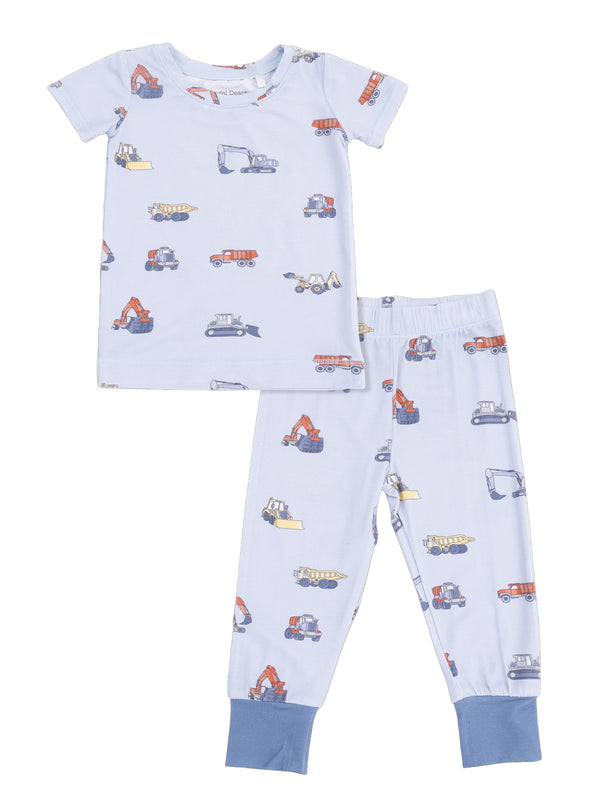 Light blue children's pajamas featuring colorful construction vehicle prints. Set includes a short-sleeve top and long pants.