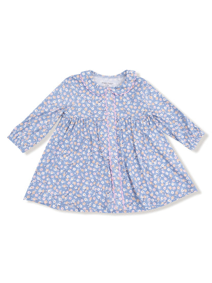 Blue floral dress with long sleeves and a round collar, featuring white, pink, and yellow flowers.