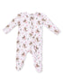 White baby onesie with abstract cowboy and cactus patterns, featuring long sleeves and footed design.