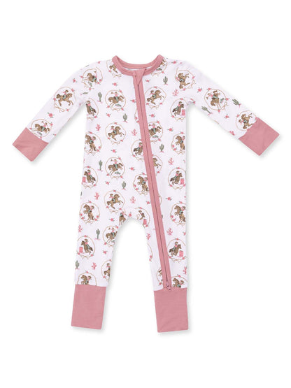 Children's zip-up onesie featuring playful illustrations, pink accents, and floral designs on a white background.