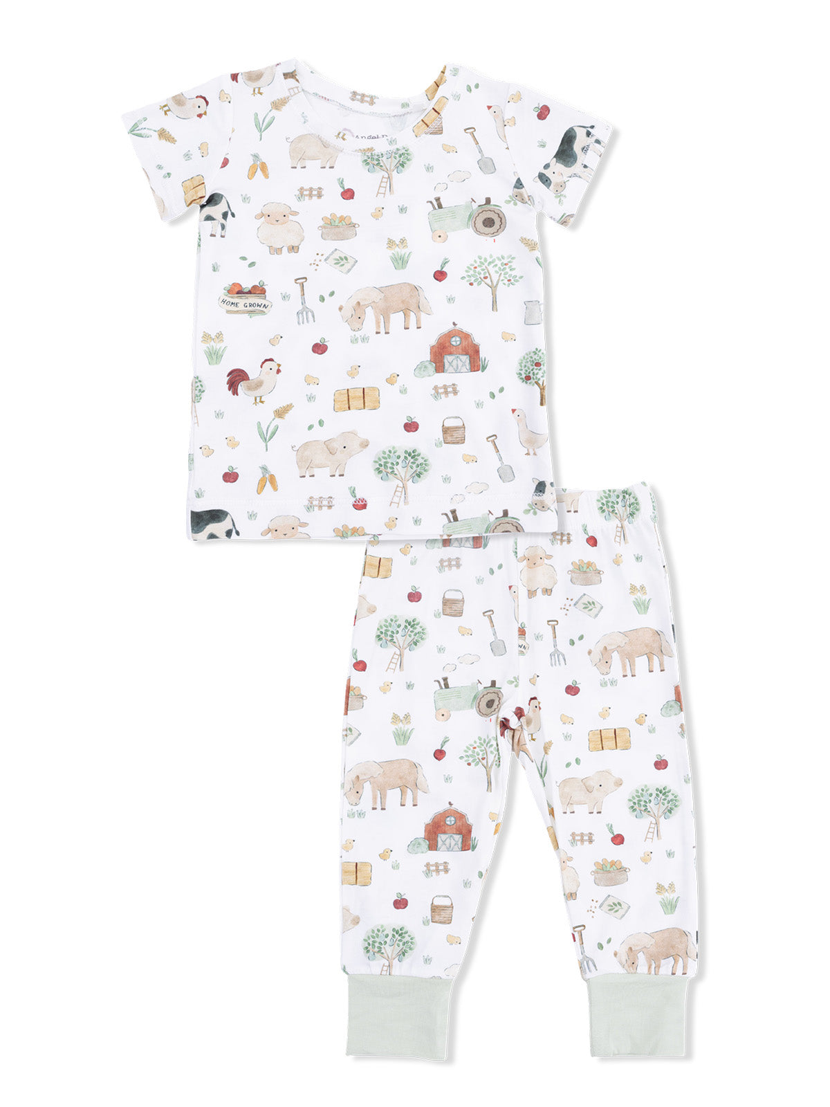Children's farm-themed pajama set featuring animals, fruits, and gardening tools in a playful print.