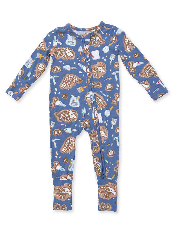 Blue baby onesie with playful prints of animal fossils and tools, featuring long sleeves and a front snap closure.