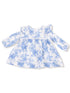 White dress with blue floral pattern and ruffled sleeves, perfect for spring or summer wear.
