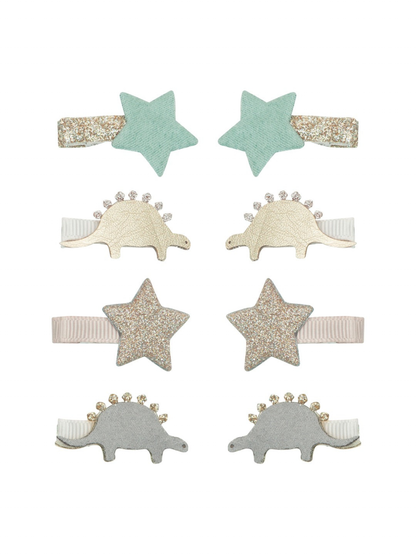 Set of hair clips featuring mint green stars and sparkly dinosaur designs in gold and silver.