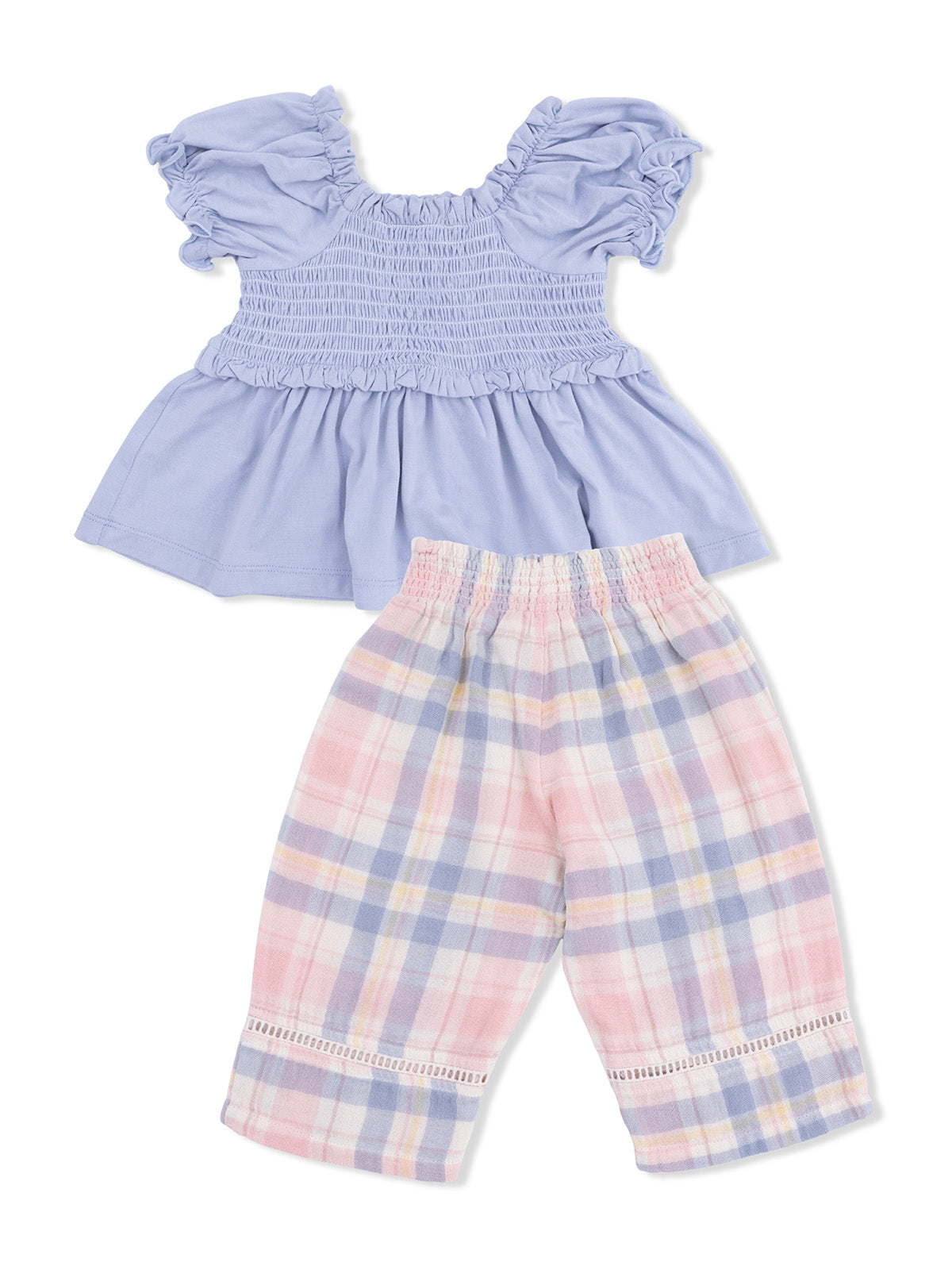 Blue smocked top with puff sleeves paired with pink and plaid capri pants for children.