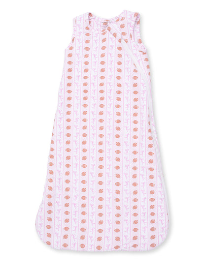 Light pink sleep sack with a pattern of cups and bows, perfect for infants and toddlers.