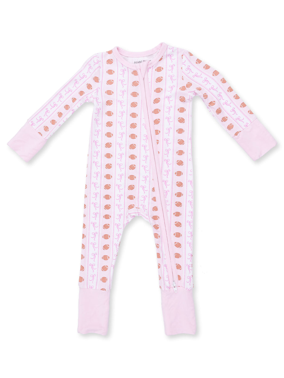 Pink zip-up onesie with playful patterns of bows and acorns on the front and solid pink cuffs. Ideal for toddlers.