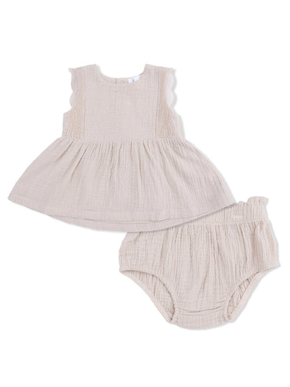 Beige toddler dress and matching bloomers, featuring ruffled sleeves and textured fabric. Ideal for cute summer outfits.