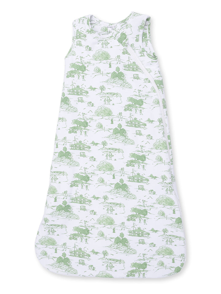 Lightweight white sleep sack with green nature-themed print, ideal for keeping babies warm and comfortable.