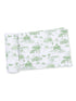 Green and white patterned fabric featuring scenic illustrations of nature and rural life.