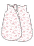 Illustration of a sleeveless baby sleep sack featuring a pastel pink countryside landscape design.