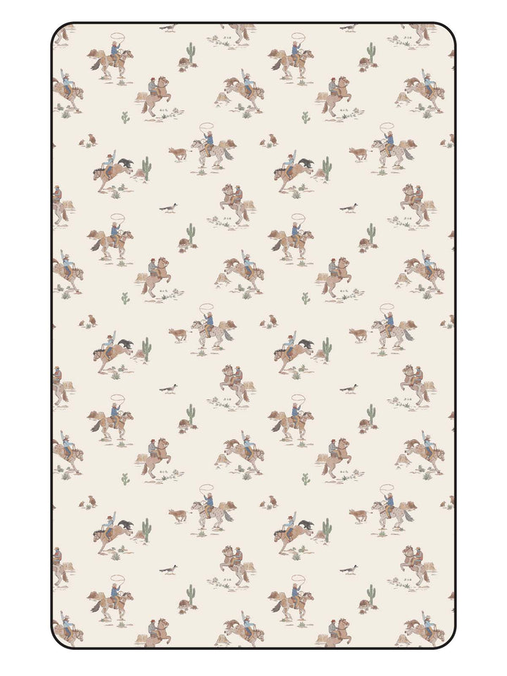 Cowboys on horseback in a desert scene with cacti and animals in a repeating pattern on a light background.