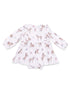 White dress with long sleeves featuring a whimsical horse print and floral accents for toddlers.