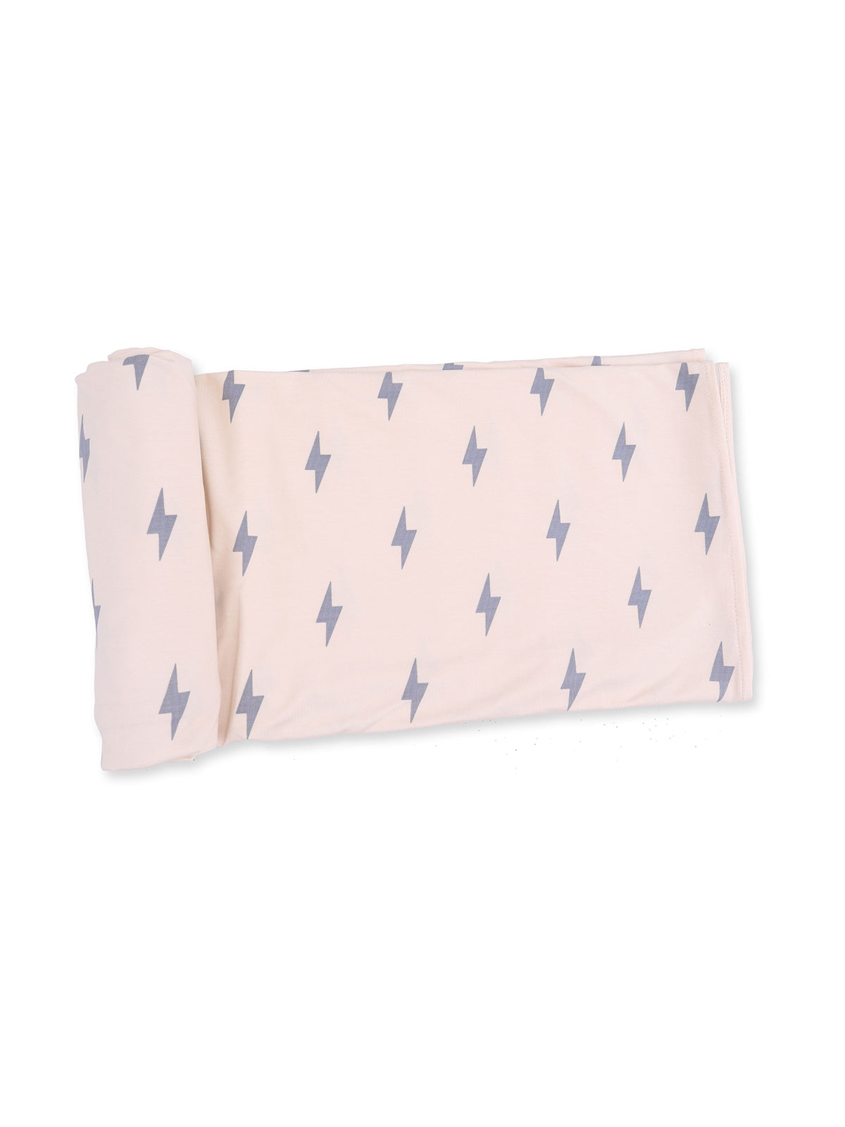 Light pink blanket rolled up with gray lightning bolt pattern, ideal for cozying up in style.