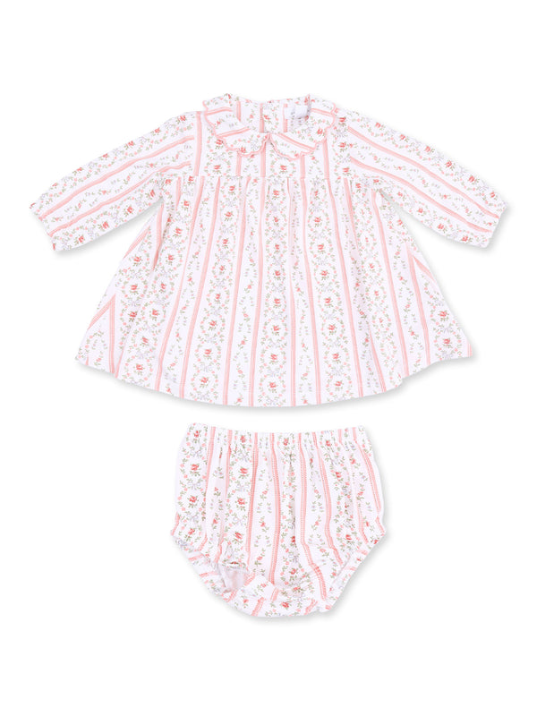 Pink and white floral dress with matching bloomers for infants, featuring a playful, vintage-inspired design.