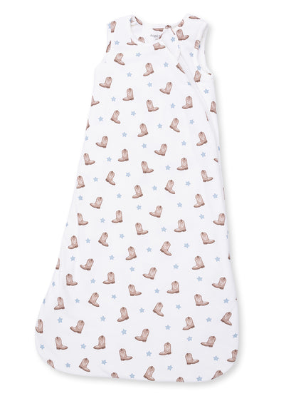 White sleeping bag with cowboy boot and star patterns for infants.