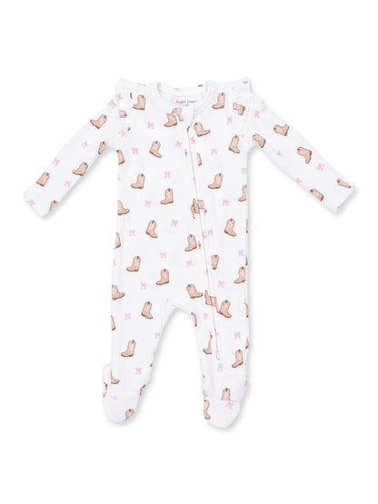 White baby onesie with boot and bow patterns, featuring zip closure and long sleeves.