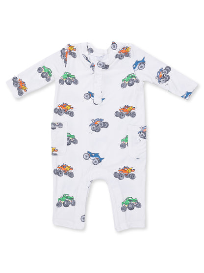 White baby onesie with colorful monster truck patterns. Ideal for playful and comfy wear.
