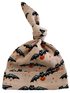 Knotted baby hat with bats and pumpkins on a light background, perfect for Halloween-themed outfits.