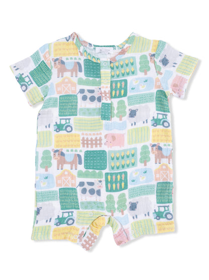 Short-sleeve infant romper featuring colorful farm animals, tractors, and crops in a playful, vibrant pattern.