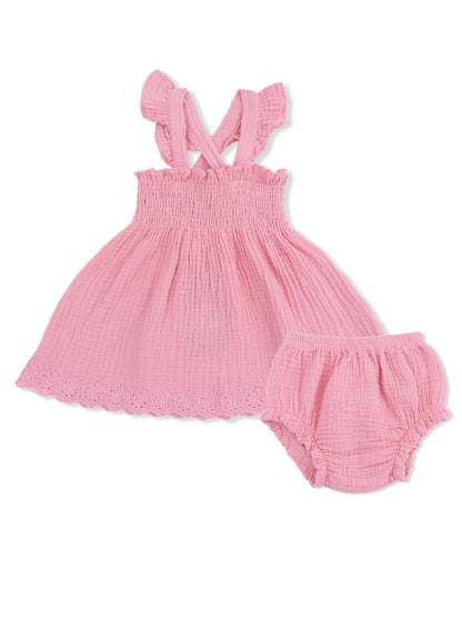 Pink infants' dress with matching bloomers, featuring ruffled straps and eyelet hem detail.
