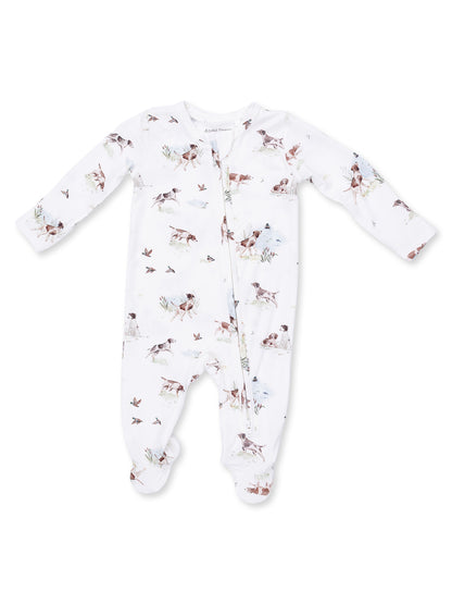 White baby onesie with dog and bird prints, featuring long sleeves and zipper closure. Perfect for comfort and style.
