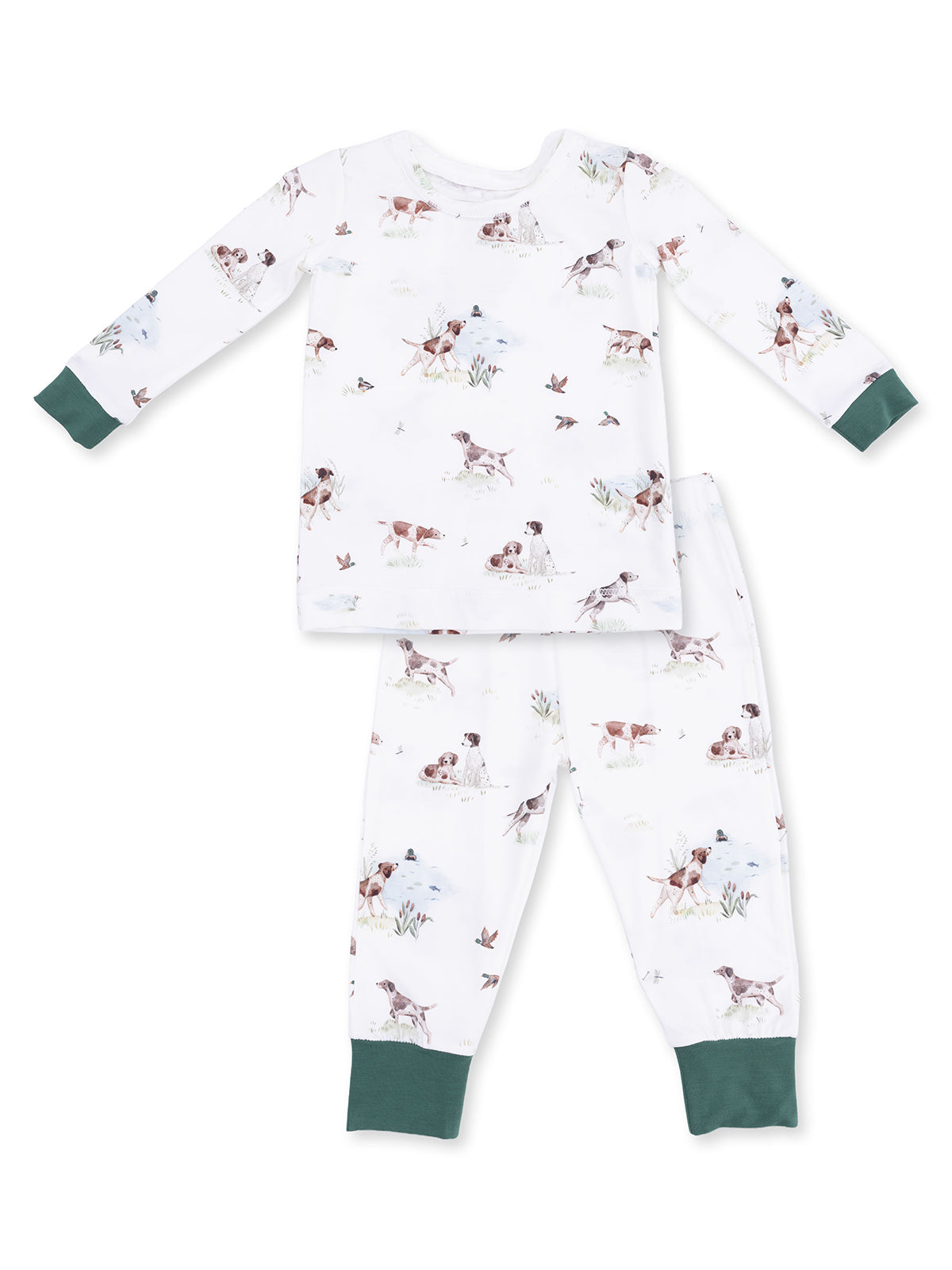 Kids' pajama set featuring playful dog and nature prints on a white background with green cuffs.