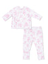 Pink children's pajama set featuring playful animal prints of puppies and their surroundings.