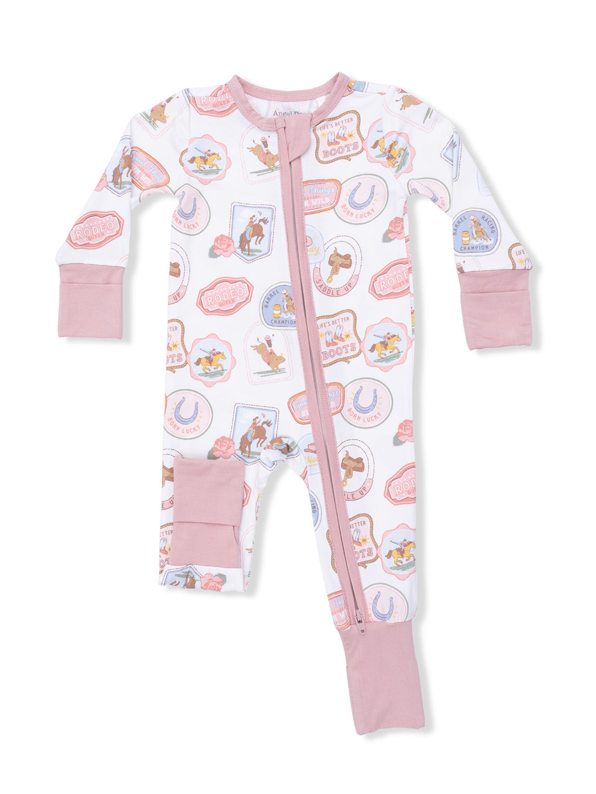 Child's rodeo-themed one-piece pajama with pink accents and playful graphics. Ideal for cozy sleepwear.
