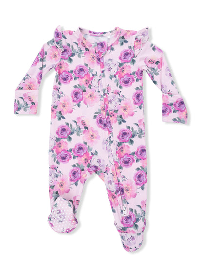 Floral-patterned baby onesie with ruffles and zipper, featuring pink and purple roses on a light pink background.