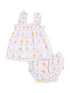 Floral baby outfit featuring a ruffled top and matching bloomers in pastel colors. Perfect for warm weather.