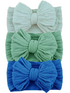 Three textured headbands in mint, green, and blue with large bows, stacked vertically on a white background.