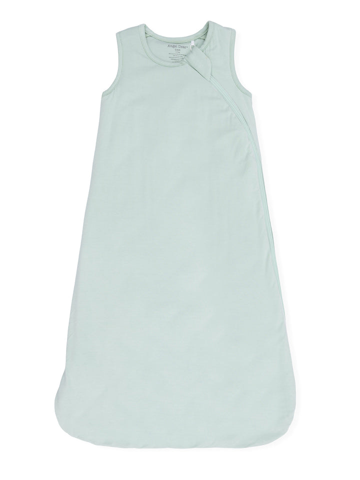 Light green baby sleep sack with sleeveless design and zipper closure. Soft material for comfort.