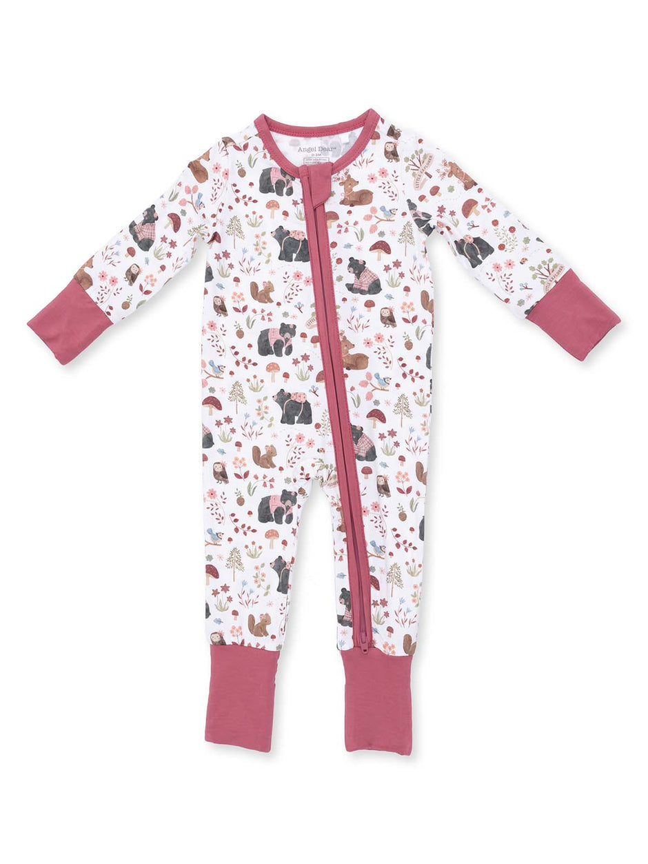 Infant pajama outfit featuring playful animal and nature patterns with a zip closure in soft colors.