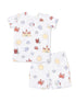 Children's beach-themed pajama set featuring castles, crabs, suns, and sea creatures on a white background.