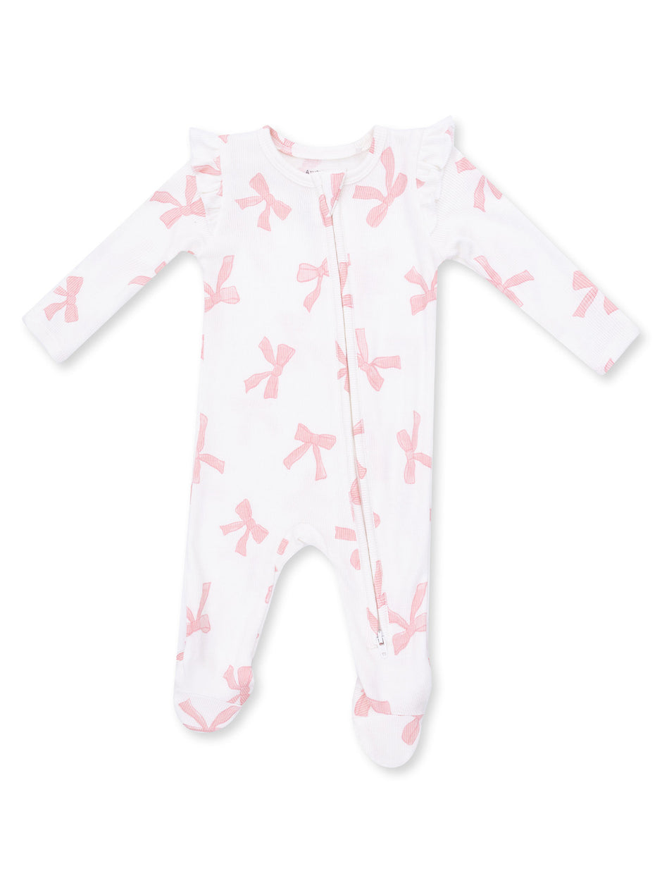White infant onesie with pink bow prints and ruffled sleeves, featuring a front zipper and footed design.