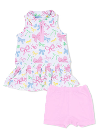 Girls' outfit featuring a sleeveless patterned top with bows and matching pink shorts.