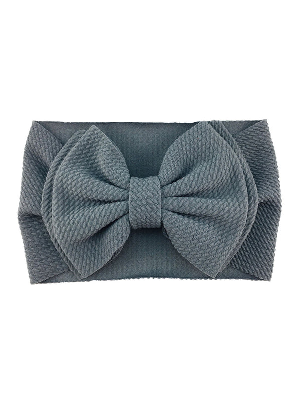 Gray fabric headband with a large, textured bow on the front.