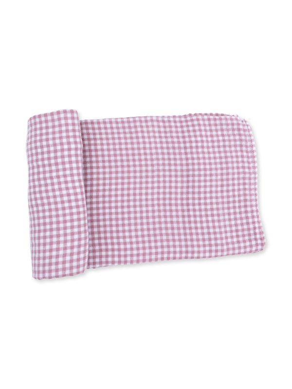 Light pink and white gingham fabric folded neatly. Ideal for crafting or home decor projects.