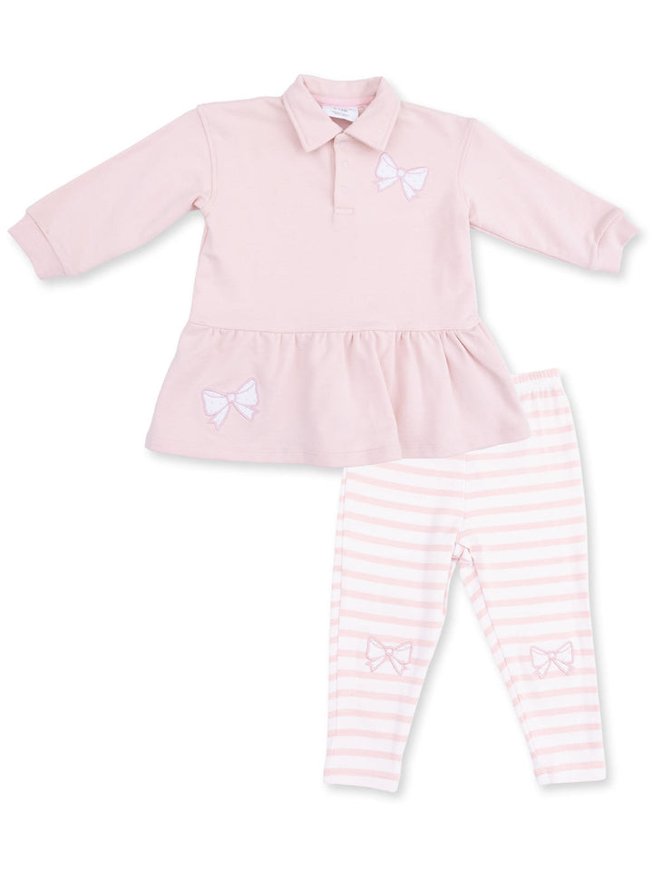 Pink toddler outfit featuring a polo top with bow accents and striped leggings with matching bows.