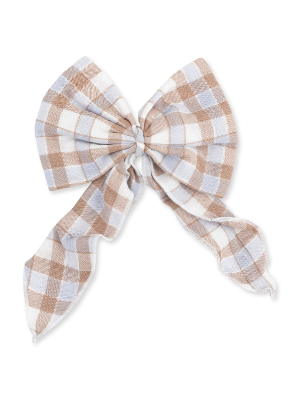 Brown and white checkered fabric bow with long tails on a white background.