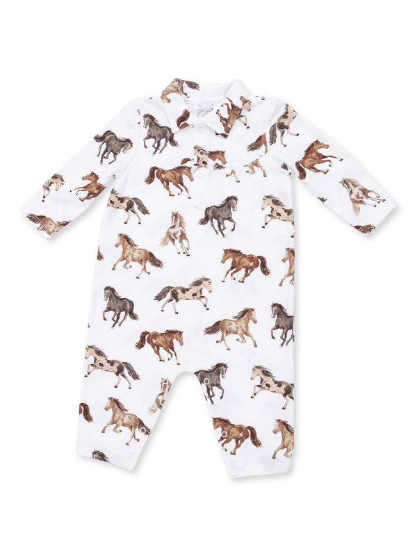 White baby romper with brown and gray horse patterns throughout. Long sleeves and collared design.