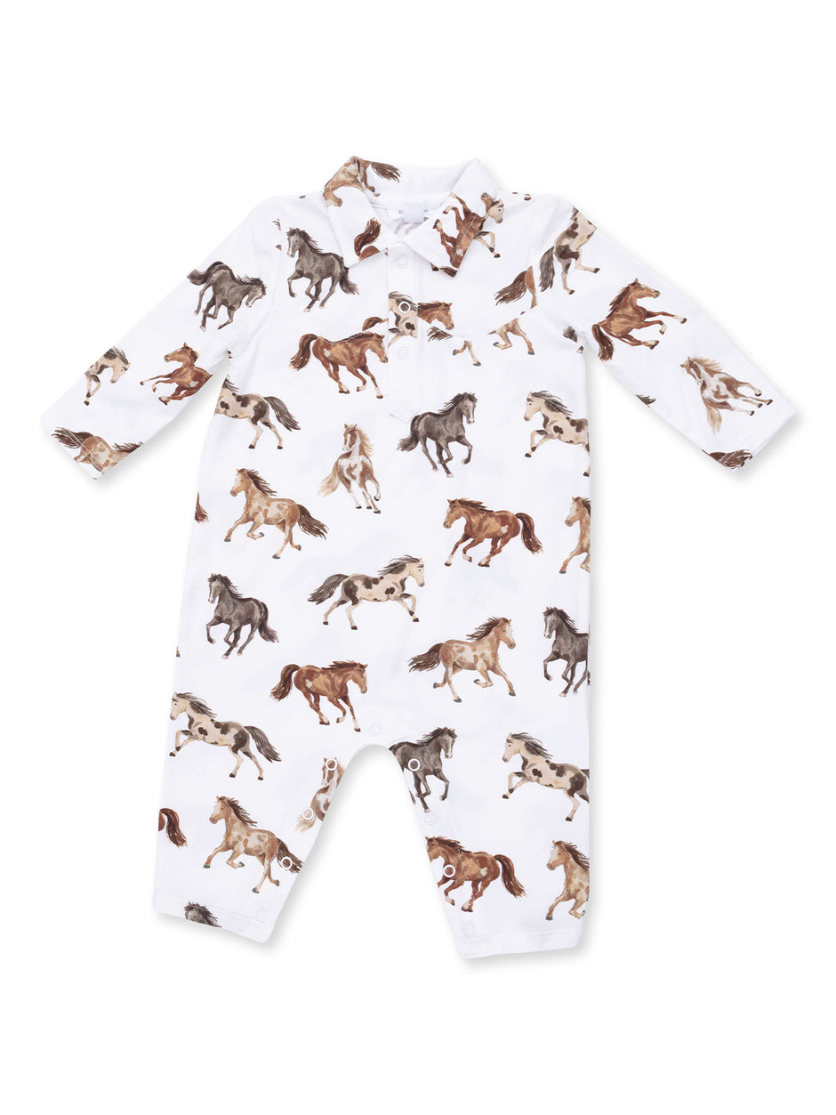 White baby romper with brown and gray horse patterns throughout. Long sleeves and collared design.